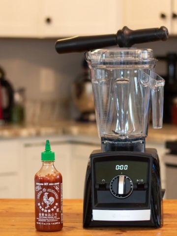 My Vitamix A2500 with an unrelated Sriracha bottle