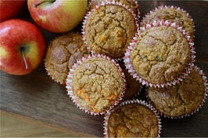 Apple muffins next to apples