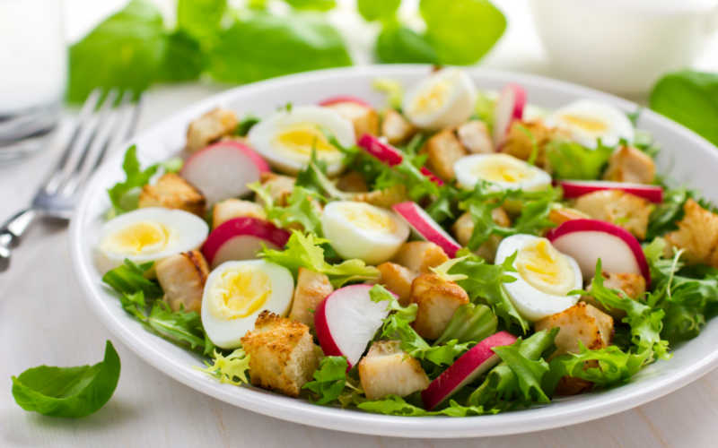 Chicken salad with quail eggs