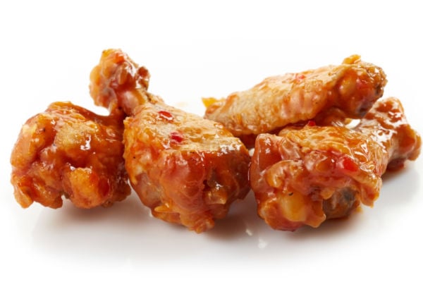 Chili chicken wings on isolated white background