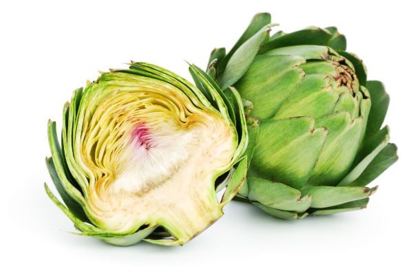 A raw artichoke cut in half