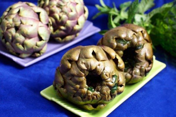 Steamed artichoke on a plate