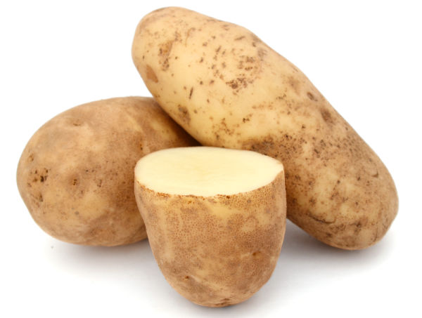 A pile of starchy potatoes on isolated white background