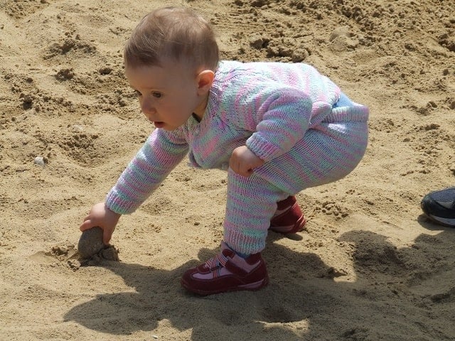 playing children in mud