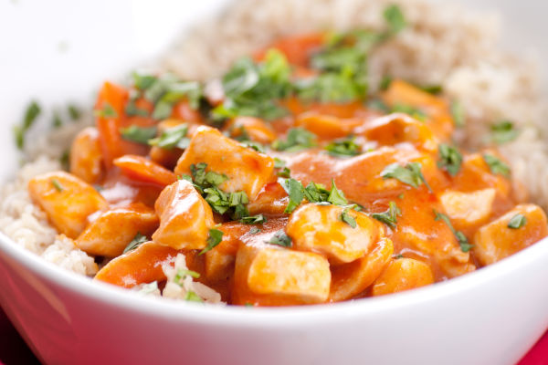 Butter chicken in a bowl with rice