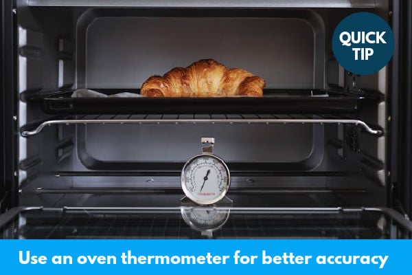 An oven with a thermometer.
