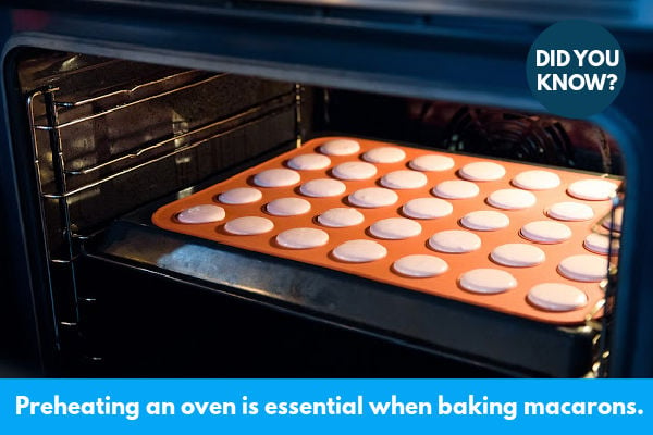 An oven with macarons cooking