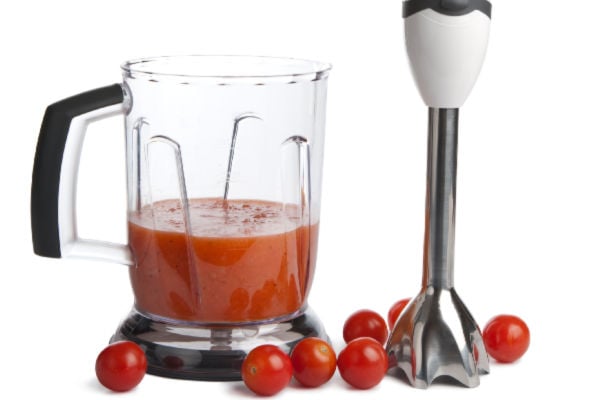 Tomato sauce next to immersion blender