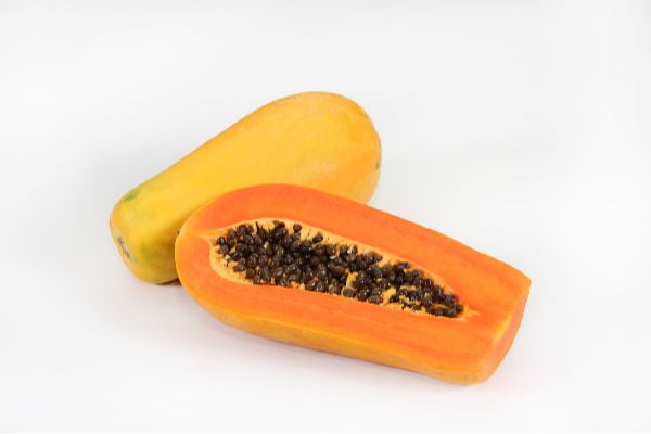 Papaya sliced in half