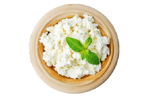 Ricotta in a bowl with a mint garnish