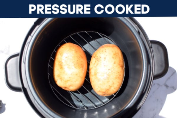 Top view of pressure cooker with potatoes in it