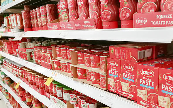 Shelf of tomato products at the grocery store