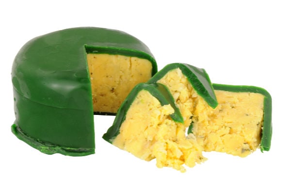 Green wax coated double Gloucester cheese