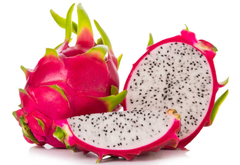 A sliced dragonfruit on an isolated white background.