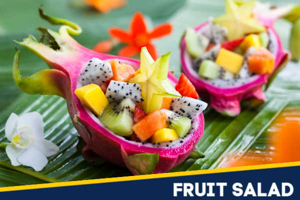 Fresh fruit salad in a dragonfruit skin.