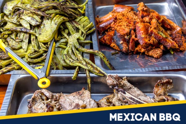 A Mexican barbecue with meat and nopales.