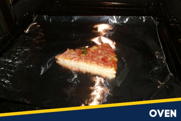 Pizza slice in an oven
