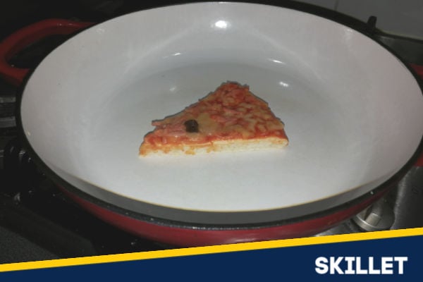 Heating pizza in a skillet