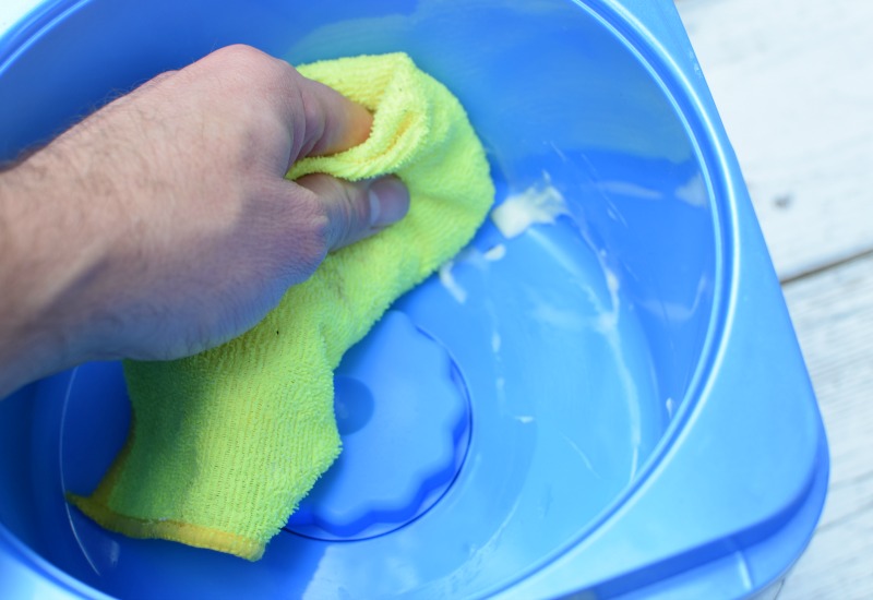 Wiping the inside of the housing with a cloth