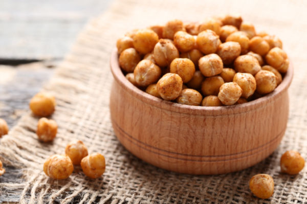 An overflowing bowl on garbanzo beans