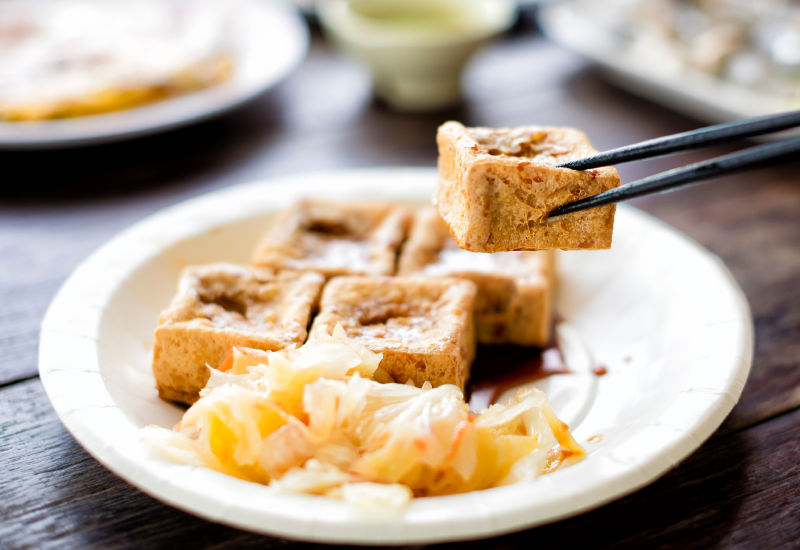 Cubed stinky tofu in a white plate