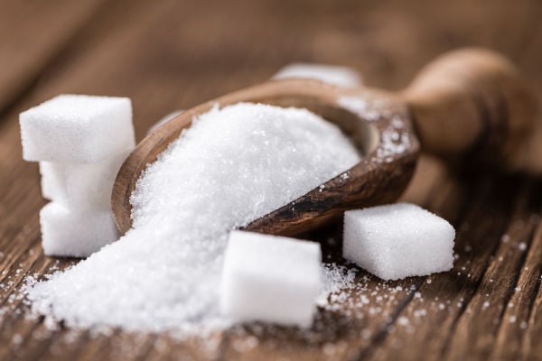White sugar in a scoop
