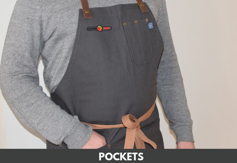 Hand in pocket of apron