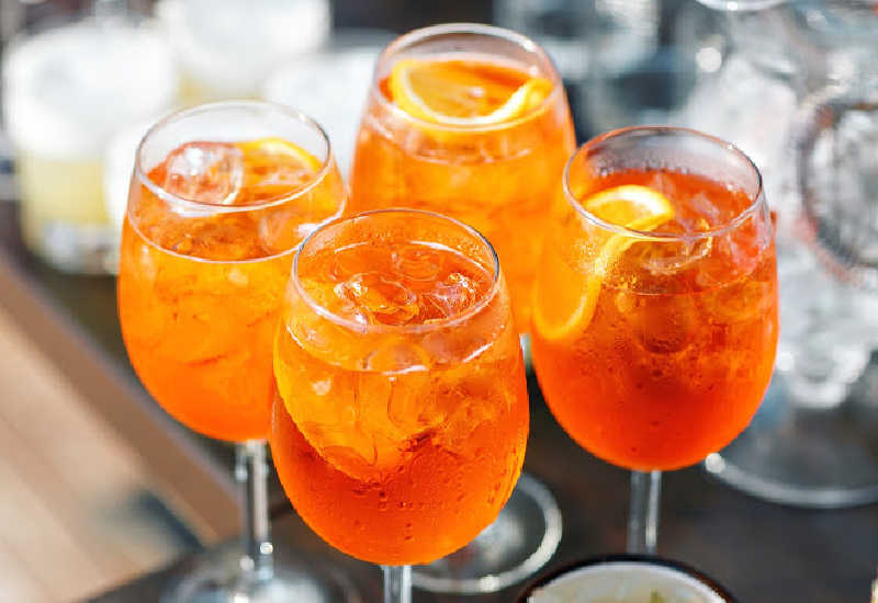 Cocktails with orange slices for a garnish