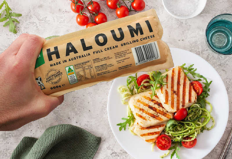 A fried halloumi salad and a pack of halloumi