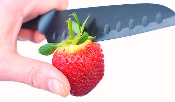 Hulling A Strawberry