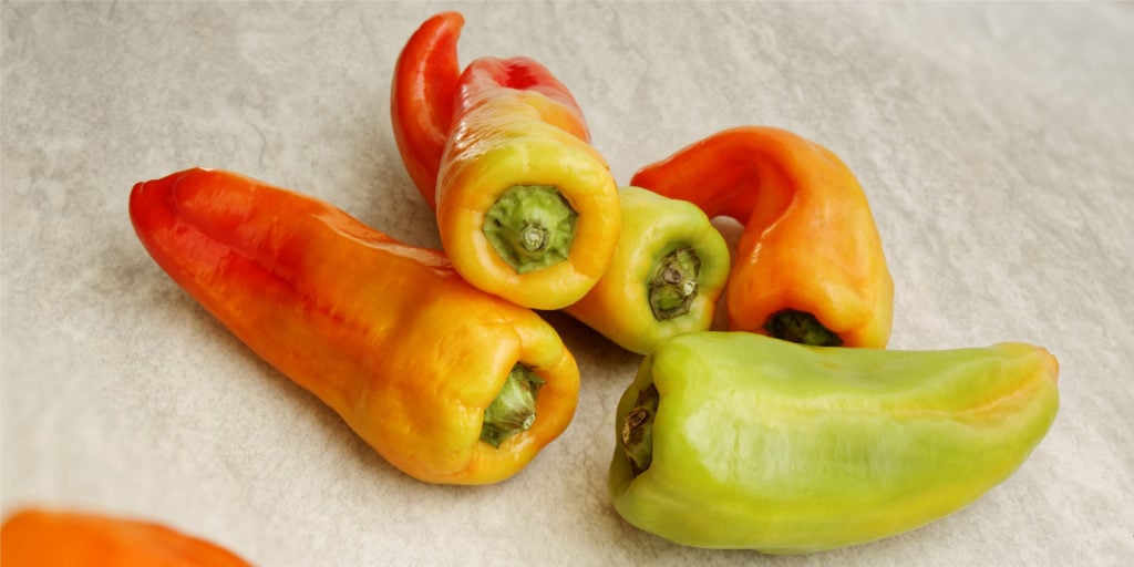 Cubanelle Peppers Piled Together 1024x512