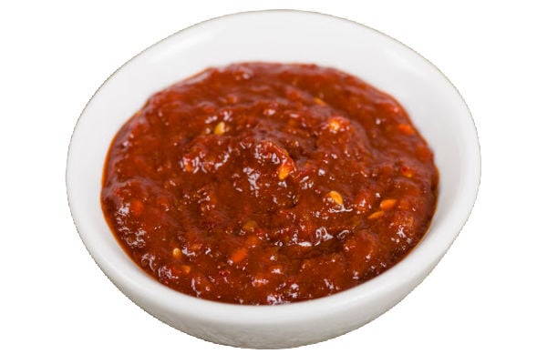 Red chili paste in a white dish