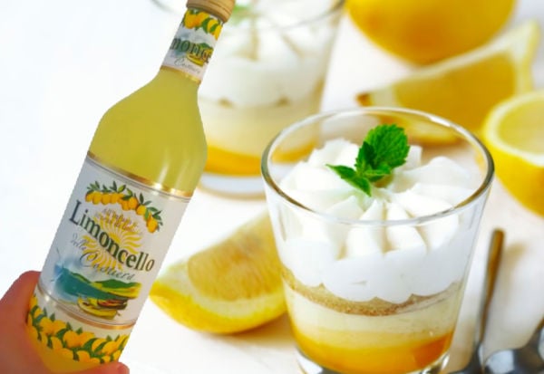 A bottle of limoncello and dessert