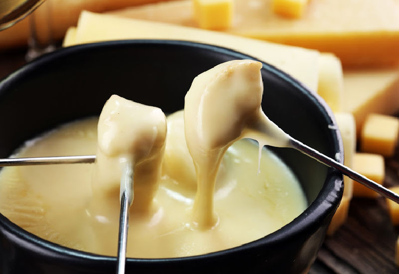 Melted fondue cheese