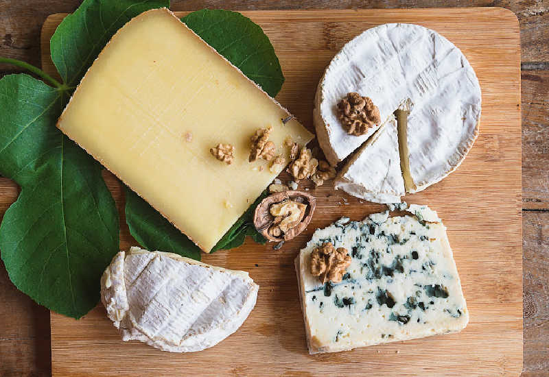 Comte on a board with other cheese types