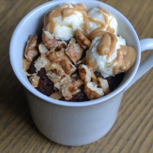 Keto mug cake with ice cream and caramel