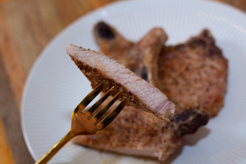 Pork Chops On Fork 1024x683