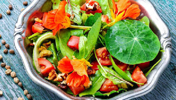 Nasturtium leaf garnish on a salad