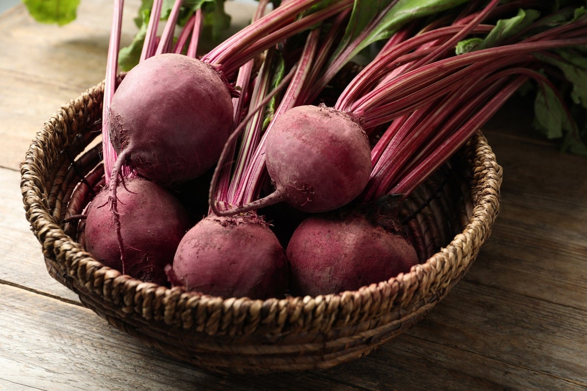 Ripe beets in a wicker bowl