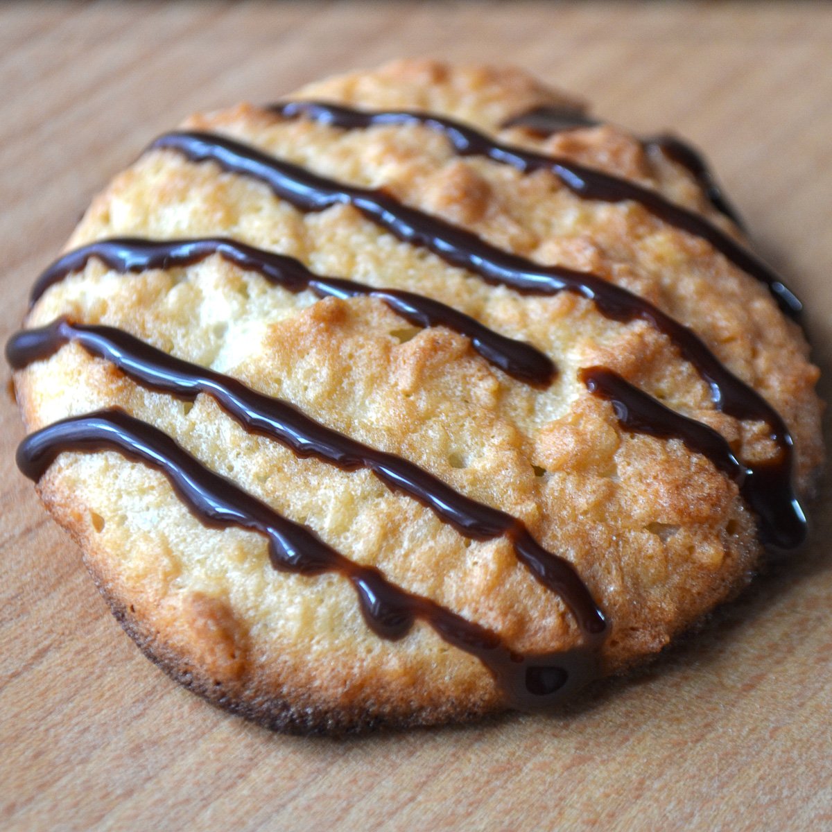 Keto coconut cookie topped with chocolate