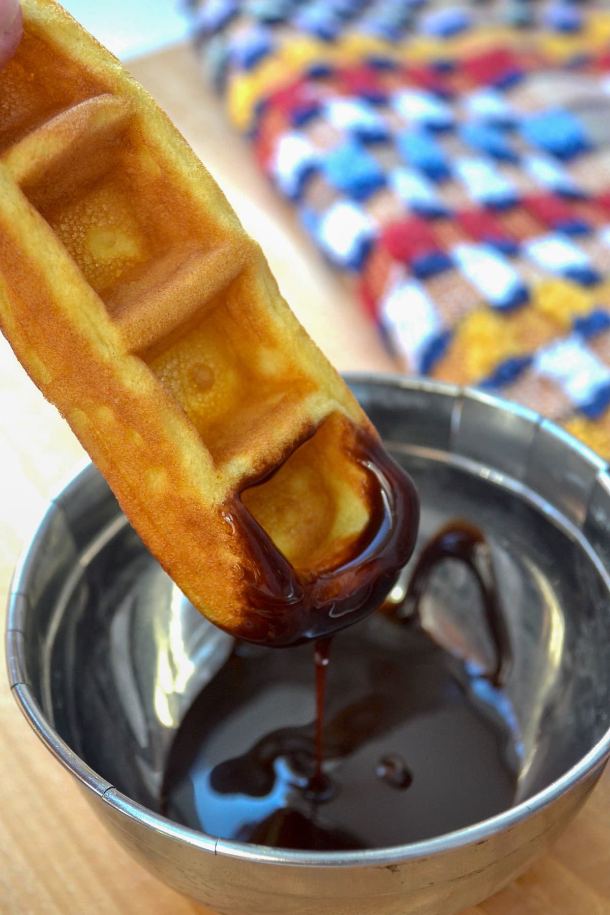Keto cream cheese waffle stick dipped in chocolate