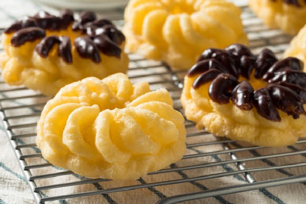 Crullers on a wire rack