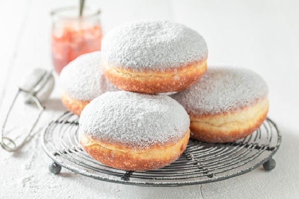 Paczki on a wire rack