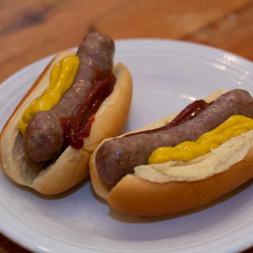 Air fried brats with mustard and ketchup