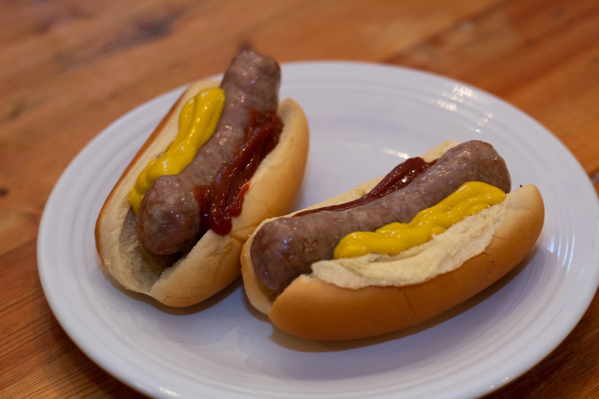 Air fried brats with mustard and ketchup