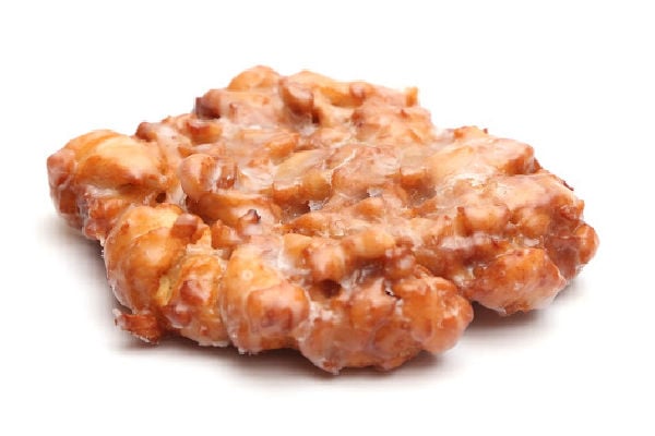 One apple fritter on white background
