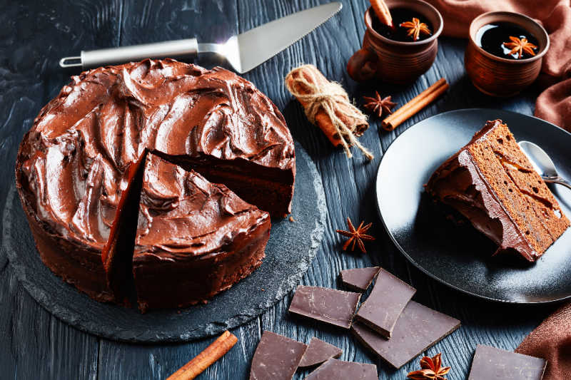 Chocolate cake next to chocolate