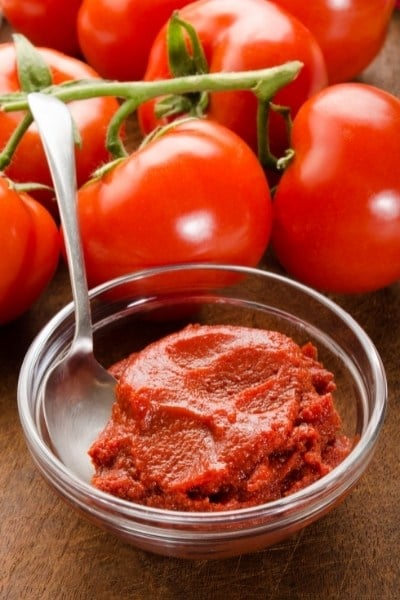 Does tomato paste contain more potassium than raw tomatoes?