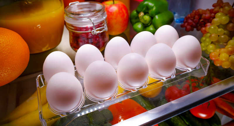 A tray of eggs in the fridge