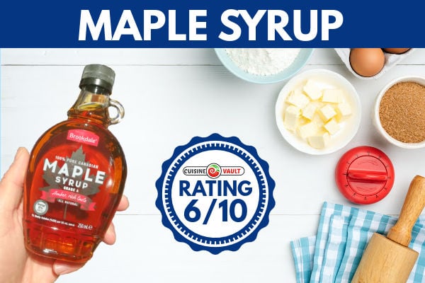 Holding a bottle of maple syrup